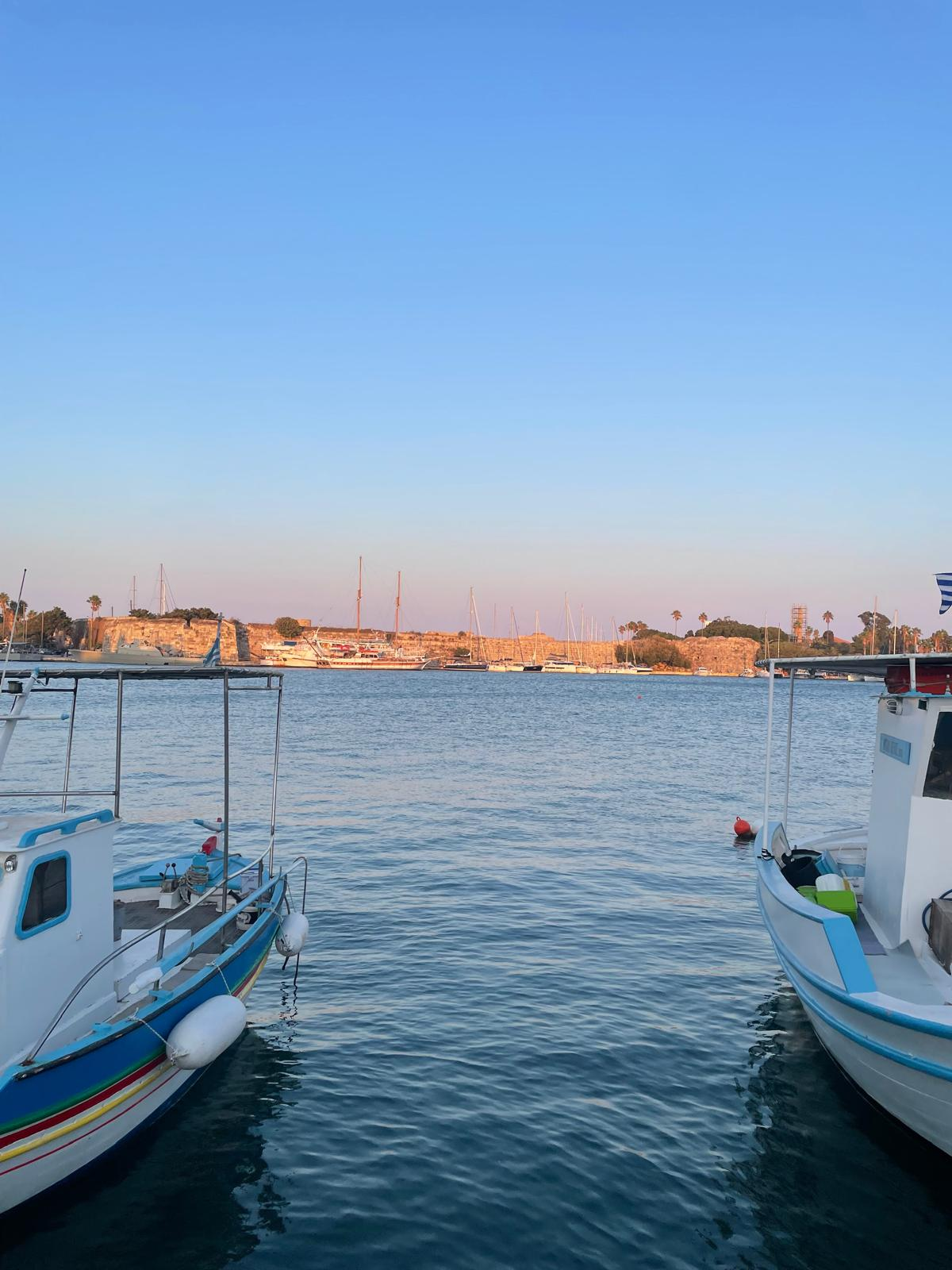 Boats moored on calm water
